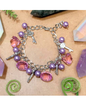 Bracelet mauve perles de verre avec clés