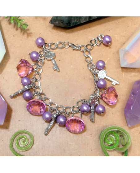 Bracelet mauve perles de verre avec clés